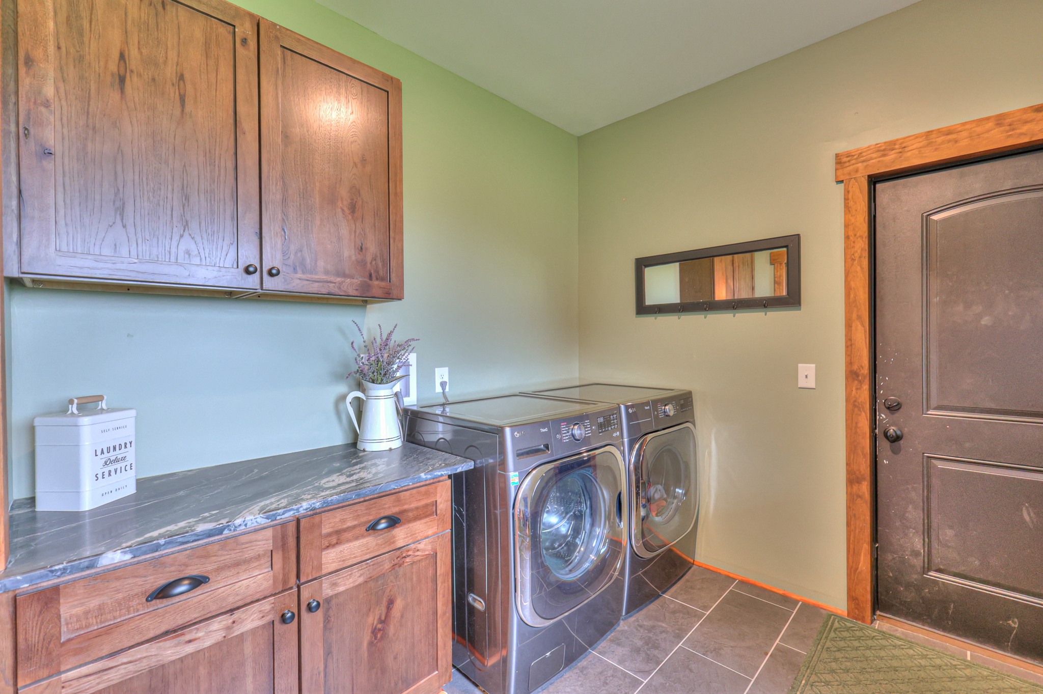 1271 Bivins Road Lewisburg, TN 37091 - Photo 24 of 56 a utility room with granite countertop cabinets washer and dryer