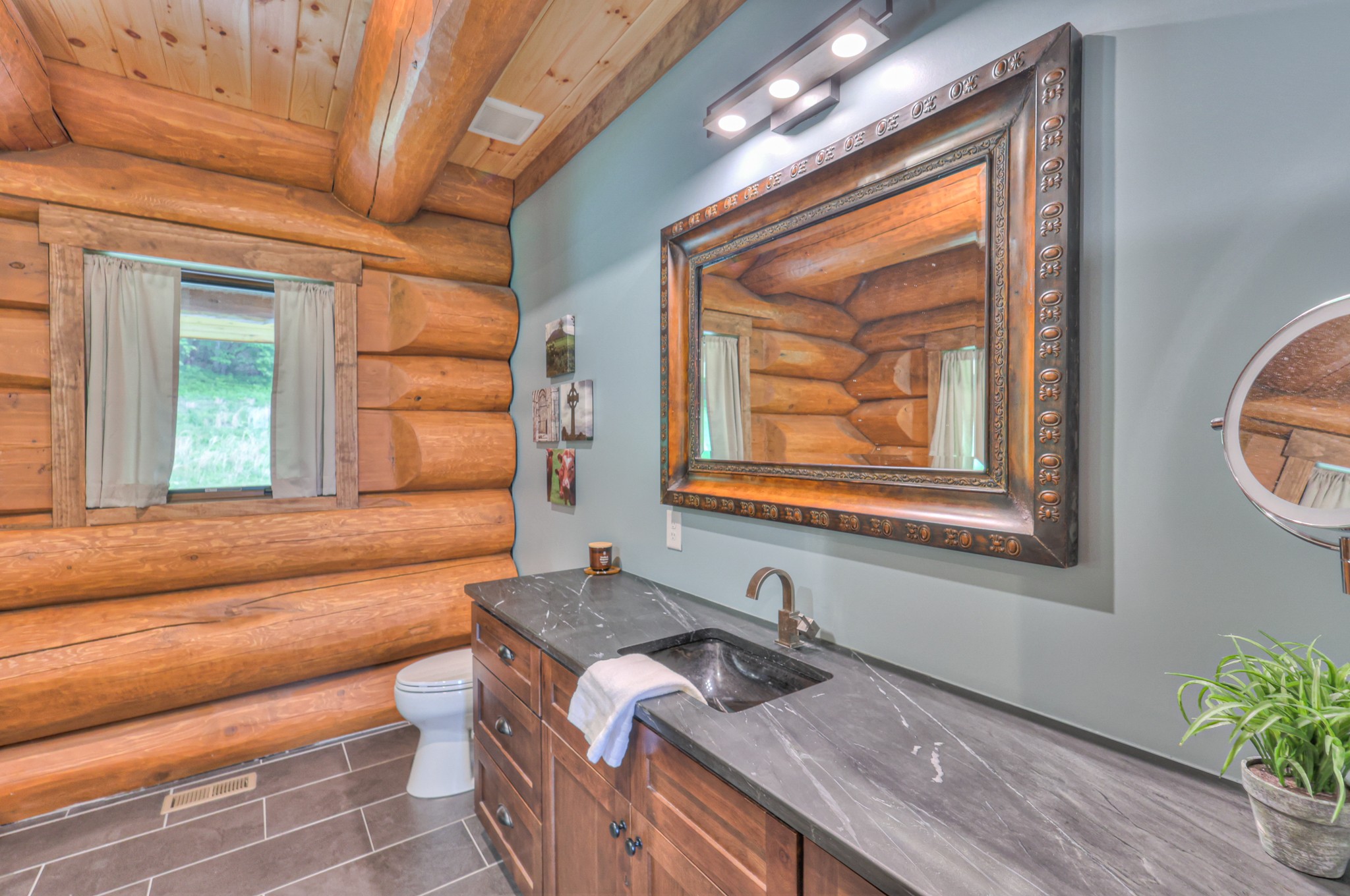 1271 Bivins Road Lewisburg, TN 37091 - Photo 31 of 56 a bathroom with a granite countertop sink and a large mirror