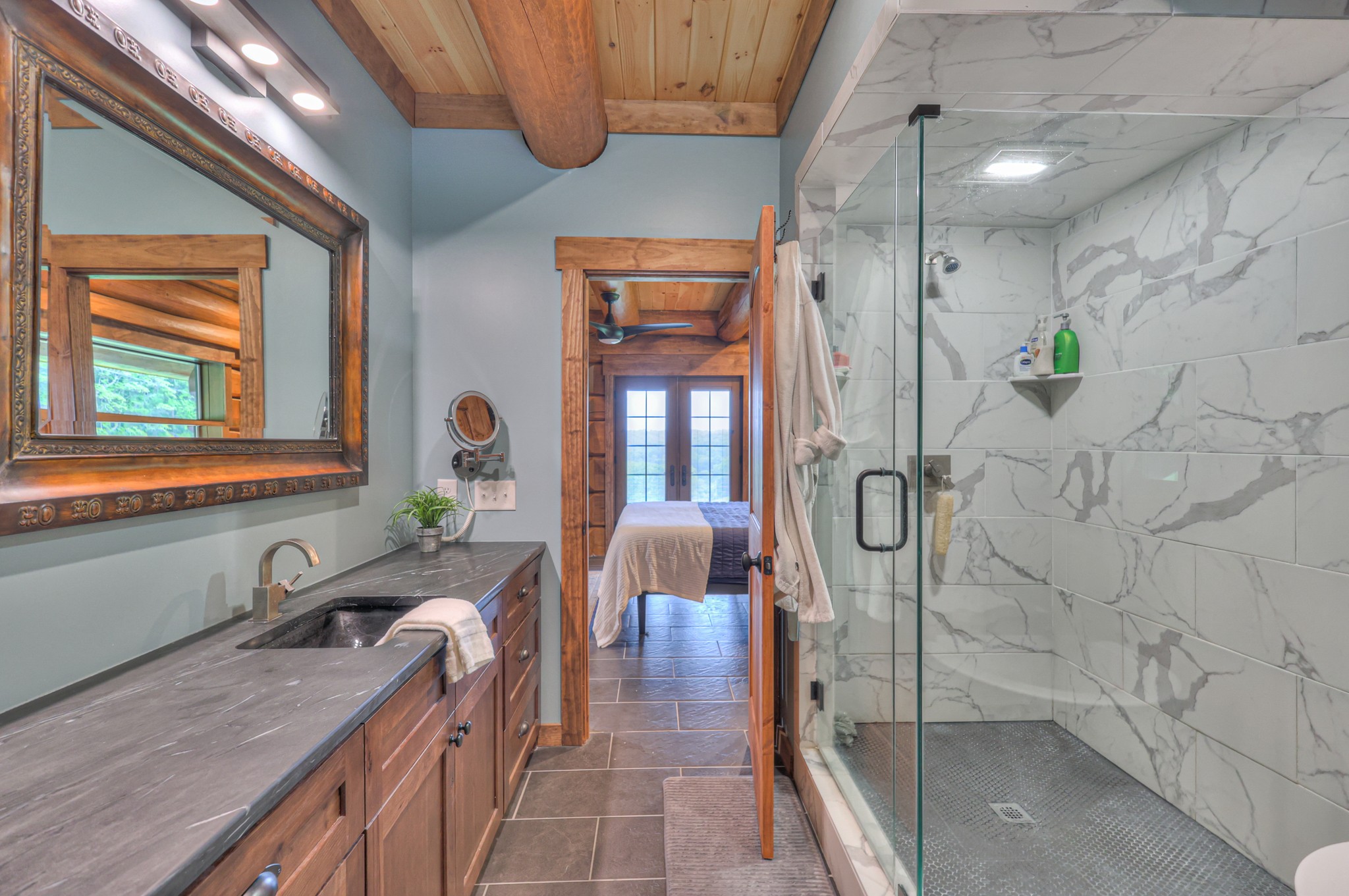 1271 Bivins Road Lewisburg, TN 37091 - Photo 33 of 56 a spacious bathroom with a granite countertop tub a mirror and shower
