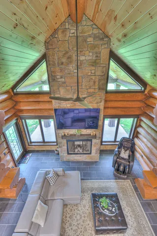 a en suite bathroom with a granite countertop sink and a mirror