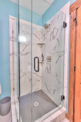 a view of outdoor space with wooden floor and stairs