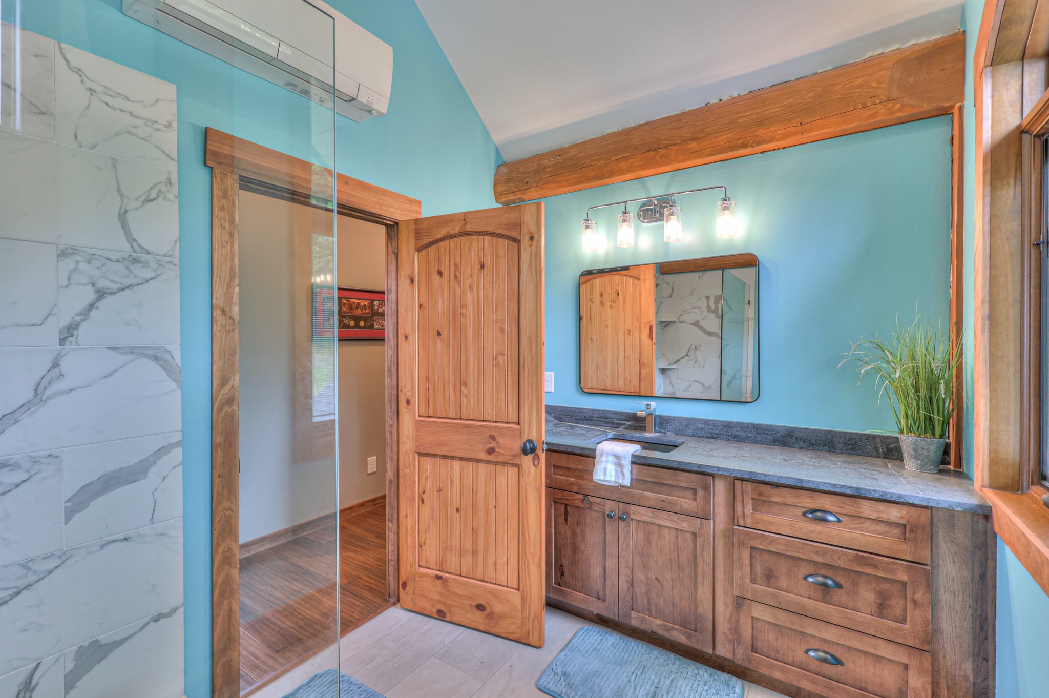 1271 Bivins Road Lewisburg, TN 37091 - Photo 48 of 56 a bathroom with a granite countertop sink and a mirror