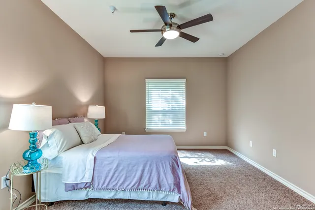 a kitchen with stainless steel appliances granite countertop a refrigerator sink stove microwave and cabinets