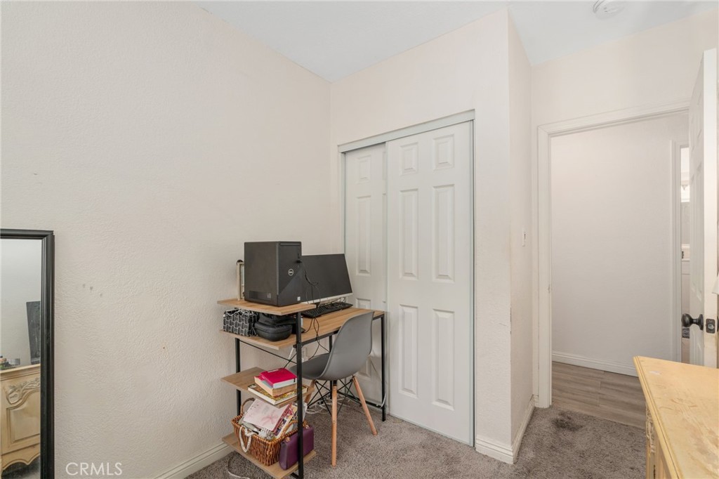 411 South Hewes Street Orange, CA 92869 - Photo 20 of 37 a view of a workspace with furniture