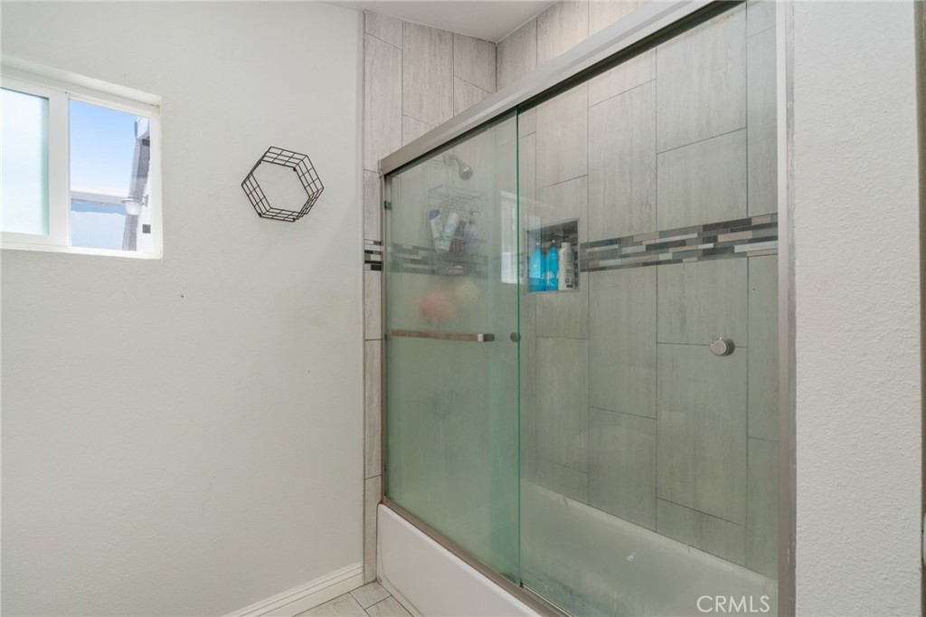 411 South Hewes Street Orange, CA 92869 - Photo 23 of 37 a bathroom with a shower