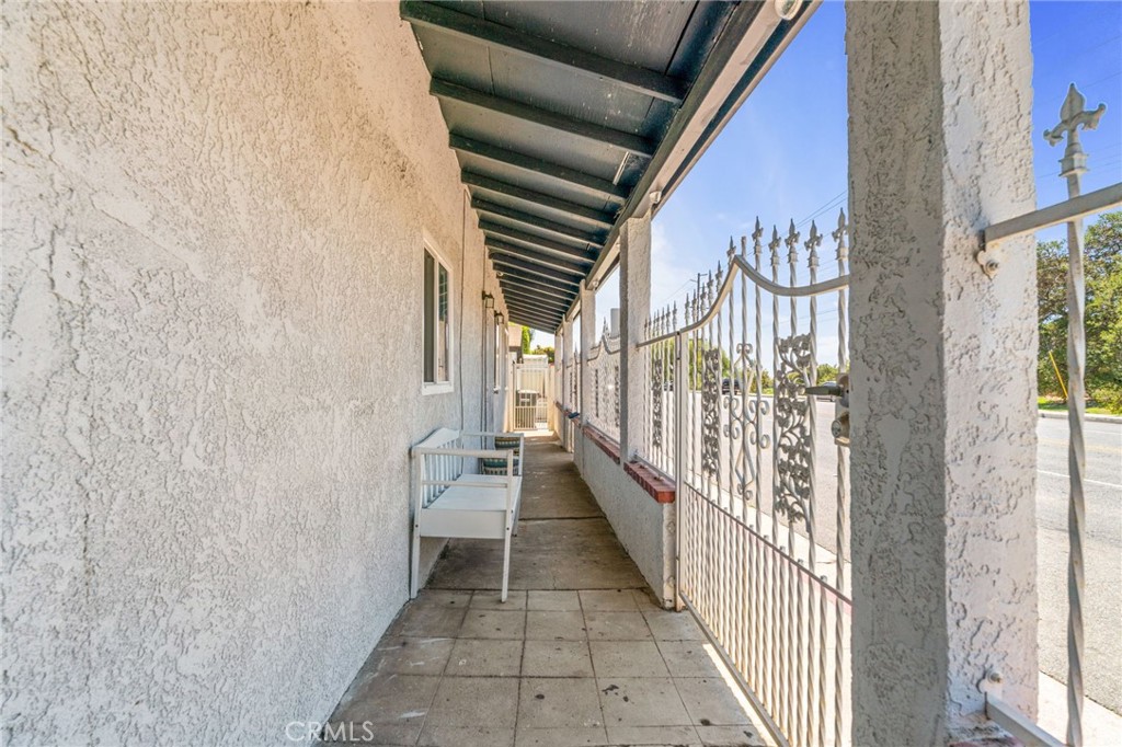 411 South Hewes Street Orange, CA 92869 - Photo 24 of 37 a view of a hallway with wooden floor and stairs