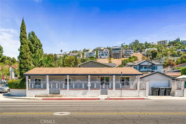 a patio with a patio table and chairs