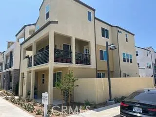 a front view of a house with parking