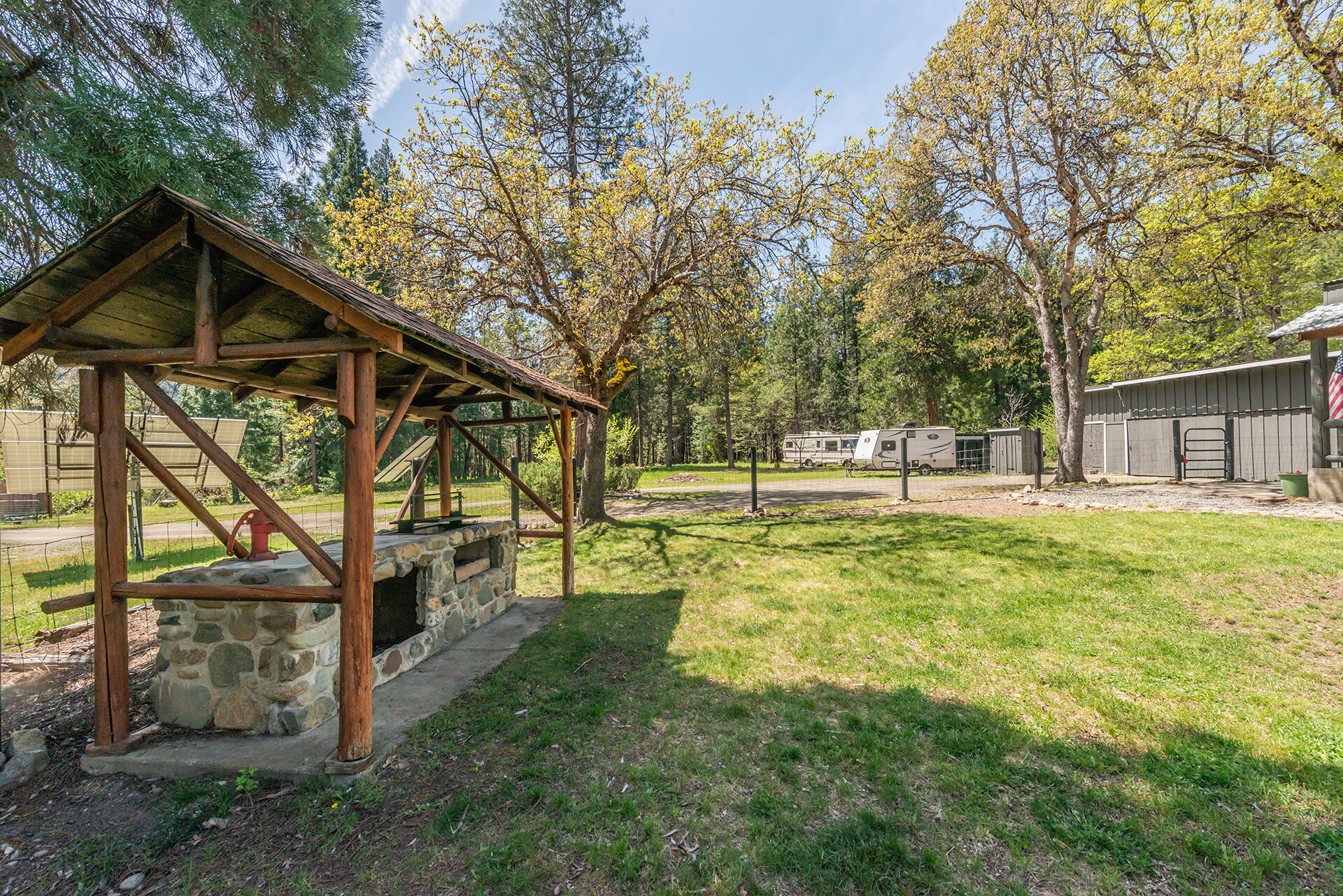 881 East Fork Road Trinity Center, CA 96091 - Photo 51 of 75 a view of a house with backyard and trees