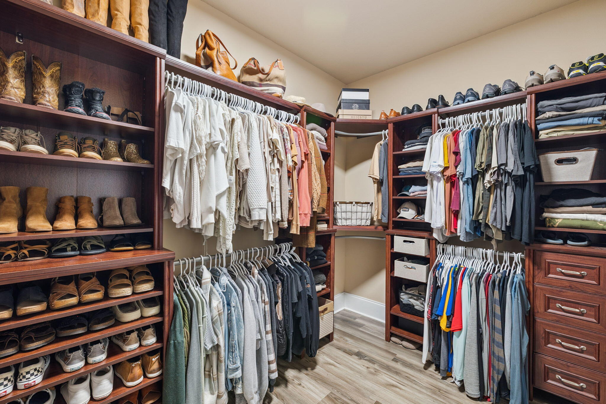 134 Mussett Bayou Court Santa Rosa Beach, FL 32459 - Photo 24 of 41 a view of walk in closet with clothes and shoes