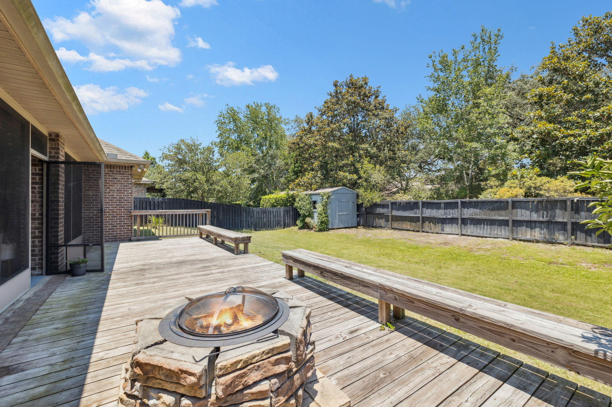 134 Mussett Bayou Court Santa Rosa Beach, FL 32459 - Photo 34 of 41 a view of a swimming pool with a lounge chairs