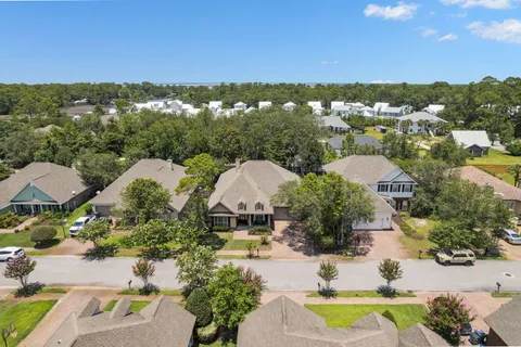 an aerial view of a house with a garden