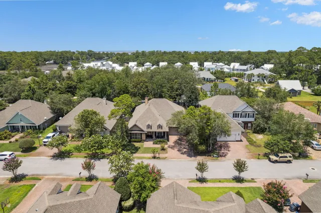 an aerial view of a house with a garden