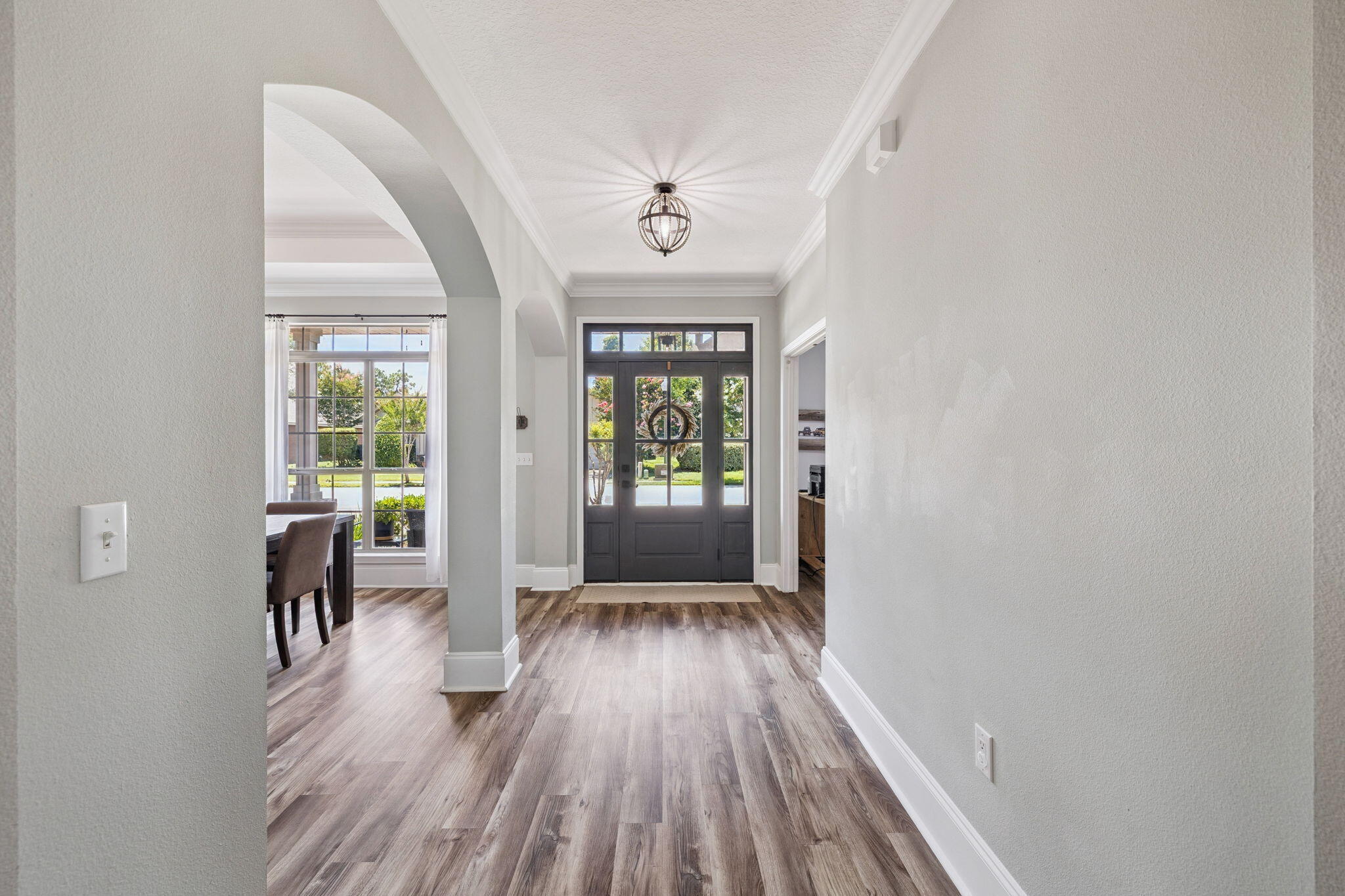 134 Mussett Bayou Court Santa Rosa Beach, FL 32459 - Photo 4 of 41 wooden floor in a hall with a window