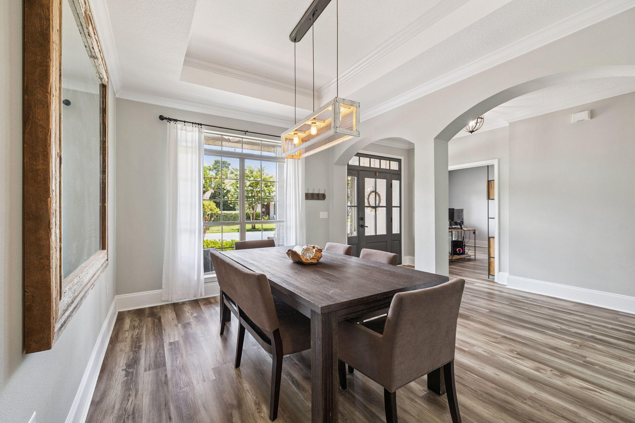 134 Mussett Bayou Court Santa Rosa Beach, FL 32459 - Photo 5 of 41 a view of a dining room with furniture window and wooden floor