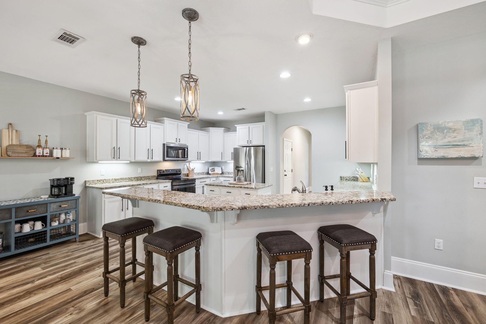 134 Mussett Bayou Court Santa Rosa Beach, FL 32459 - Photo 10 of 41 a kitchen with cabinets and chairs