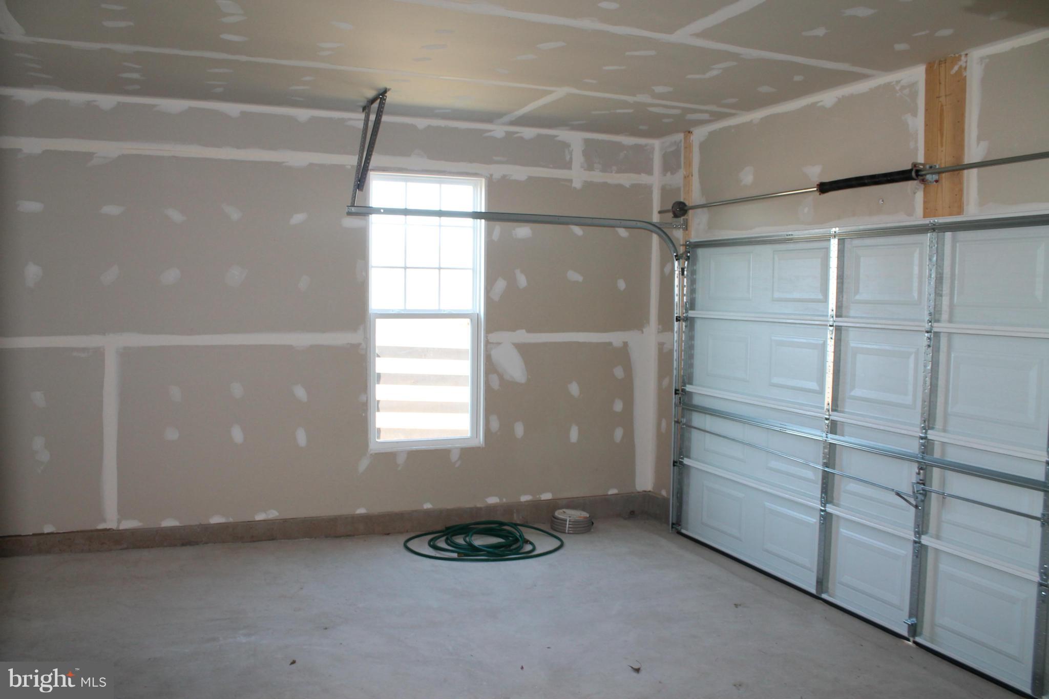 22017 Millwick Terrace Ashburn, VA 20148 - Photo 11 of 19 Garage