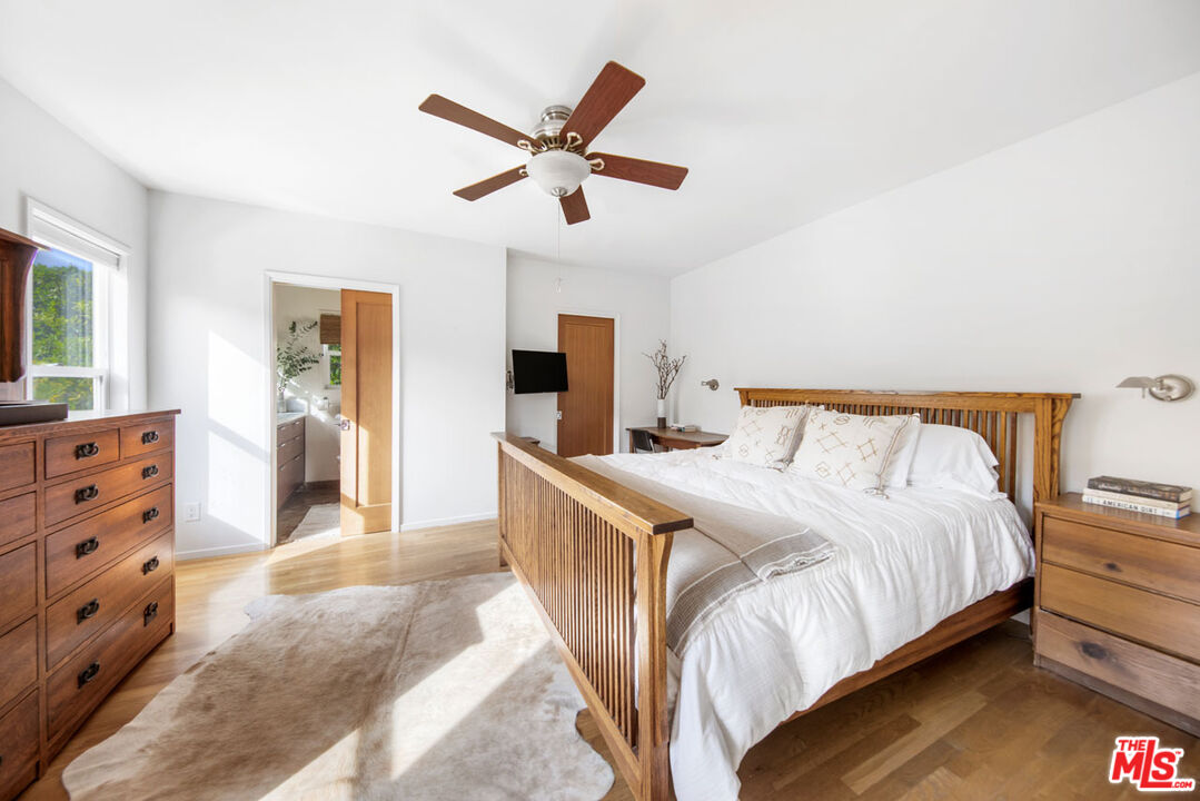 1715 Sinaloa Avenue Pasadena, CA 91104 - Photo 16 of 33 a spacious bedroom with a bed and a dresser