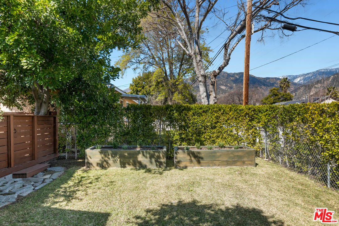 1715 Sinaloa Avenue Pasadena, CA 91104 - Photo 3 of 33 a view of a chair and tables