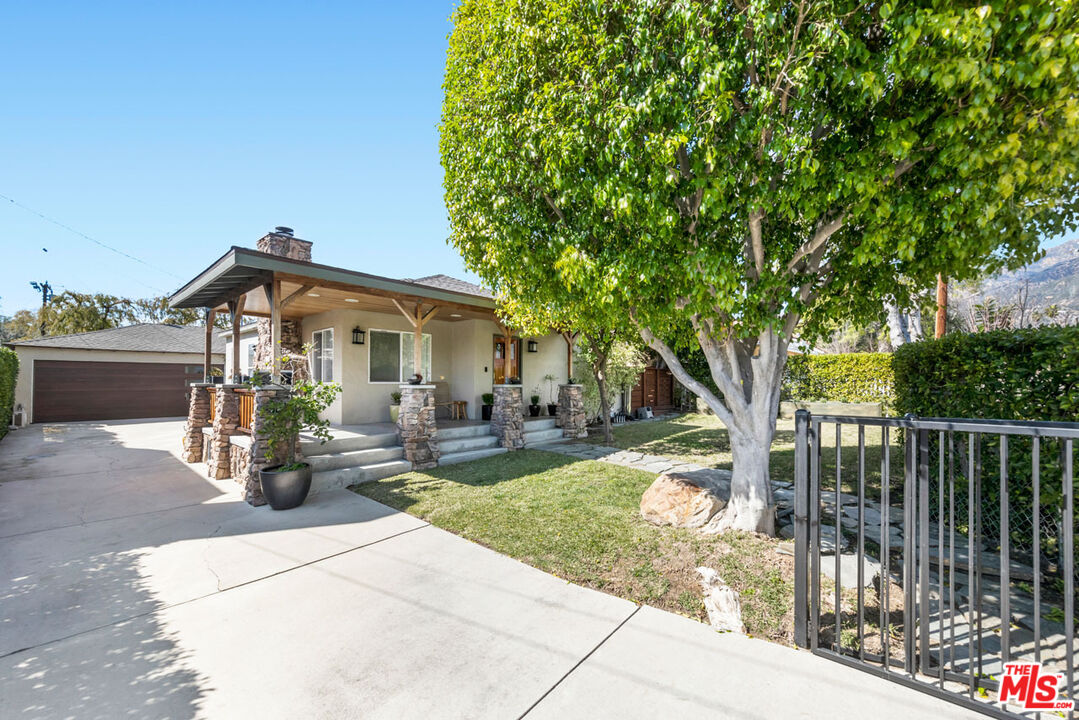 1715 Sinaloa Avenue Pasadena, CA 91104 - Photo 32 of 33 a front view of a house with garden