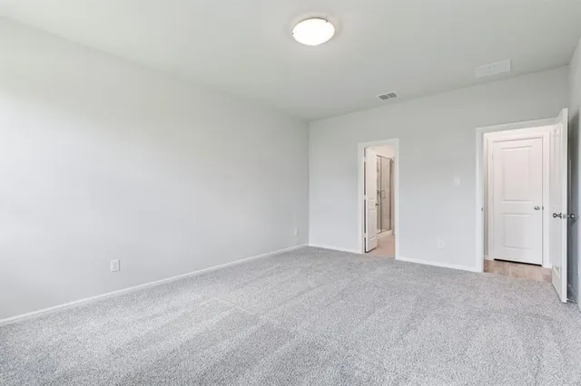 an empty room with an entryway