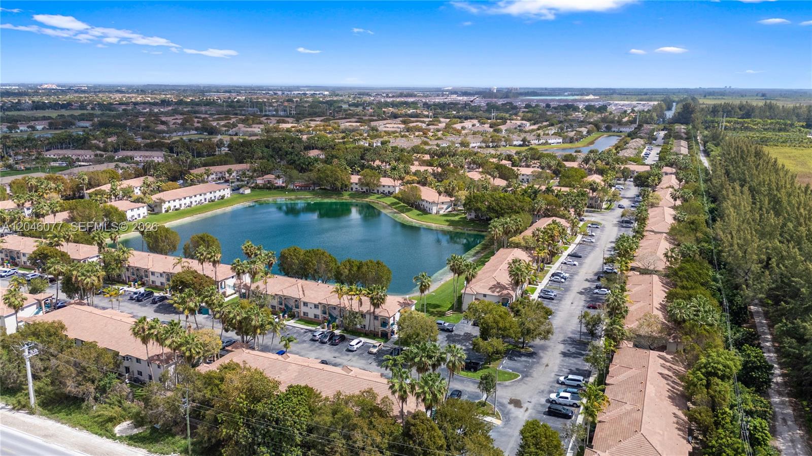 2930 Southeast 12th Road, Unit 20431 Homestead, FL 33035 - Photo 36 of 37 an aerial view of a city with ocean view
