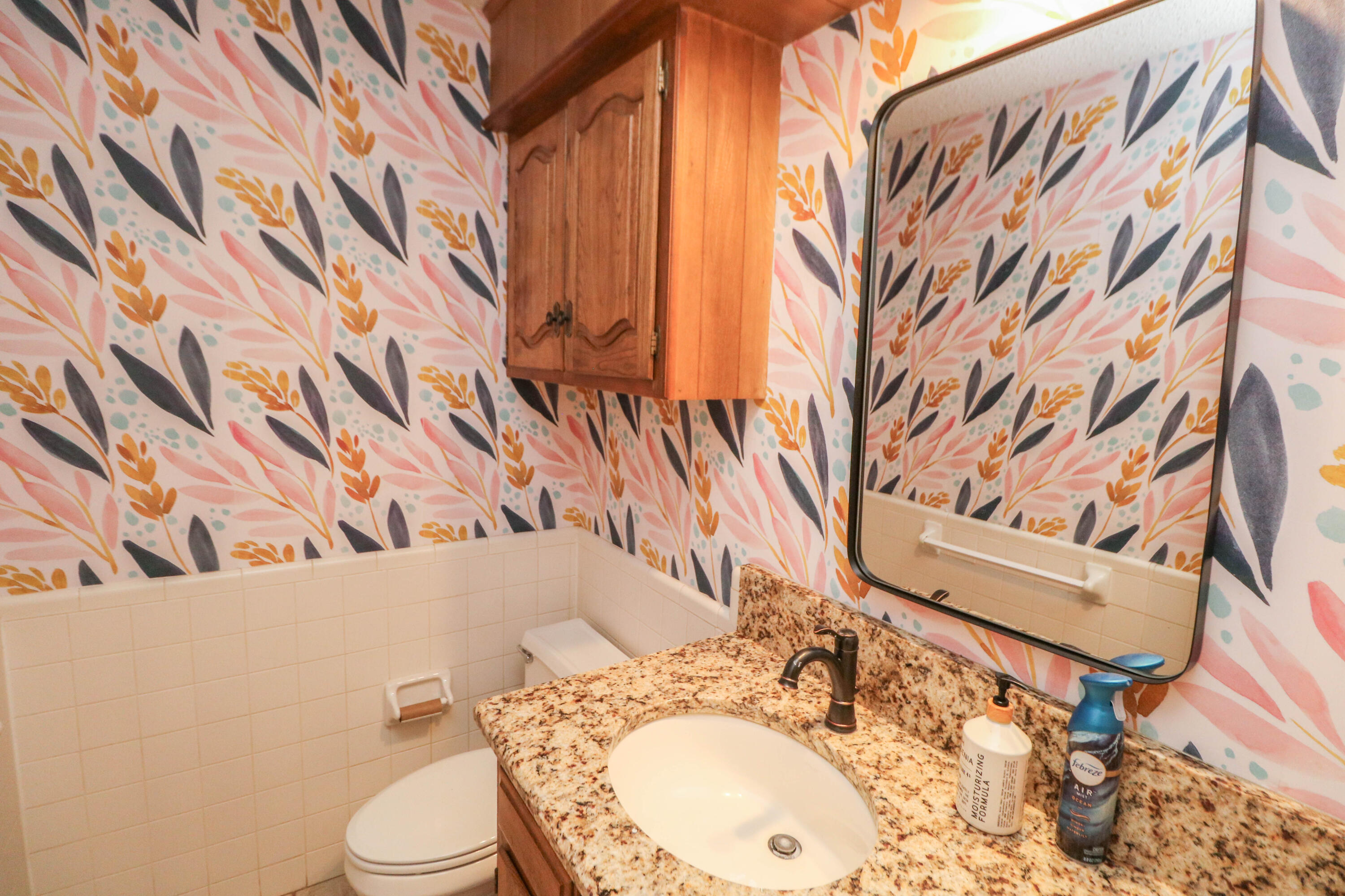 1740 Highway 70 Springlake, TX 79082 - Photo 20 of 39 a bathroom with a sink and mirror with toilet