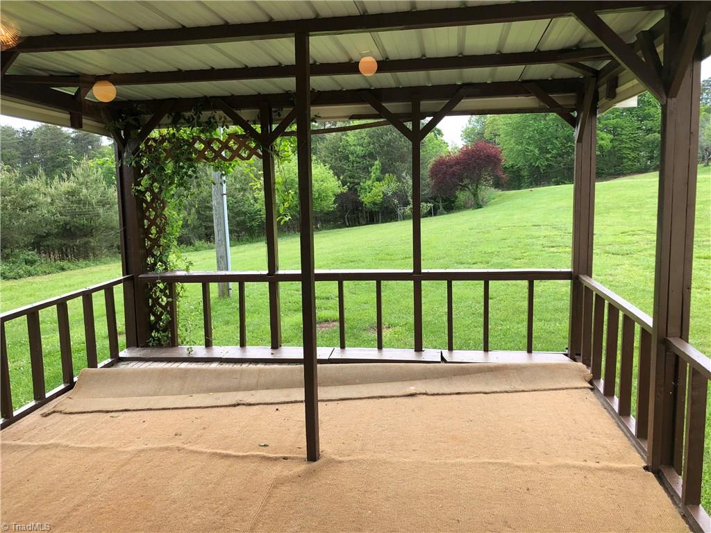 1071 Jackson Road Westfield, NC 27053 - Photo 18 of 19 This Covered side porch off the breakfast nook is great for relaxing on a warm summer day.