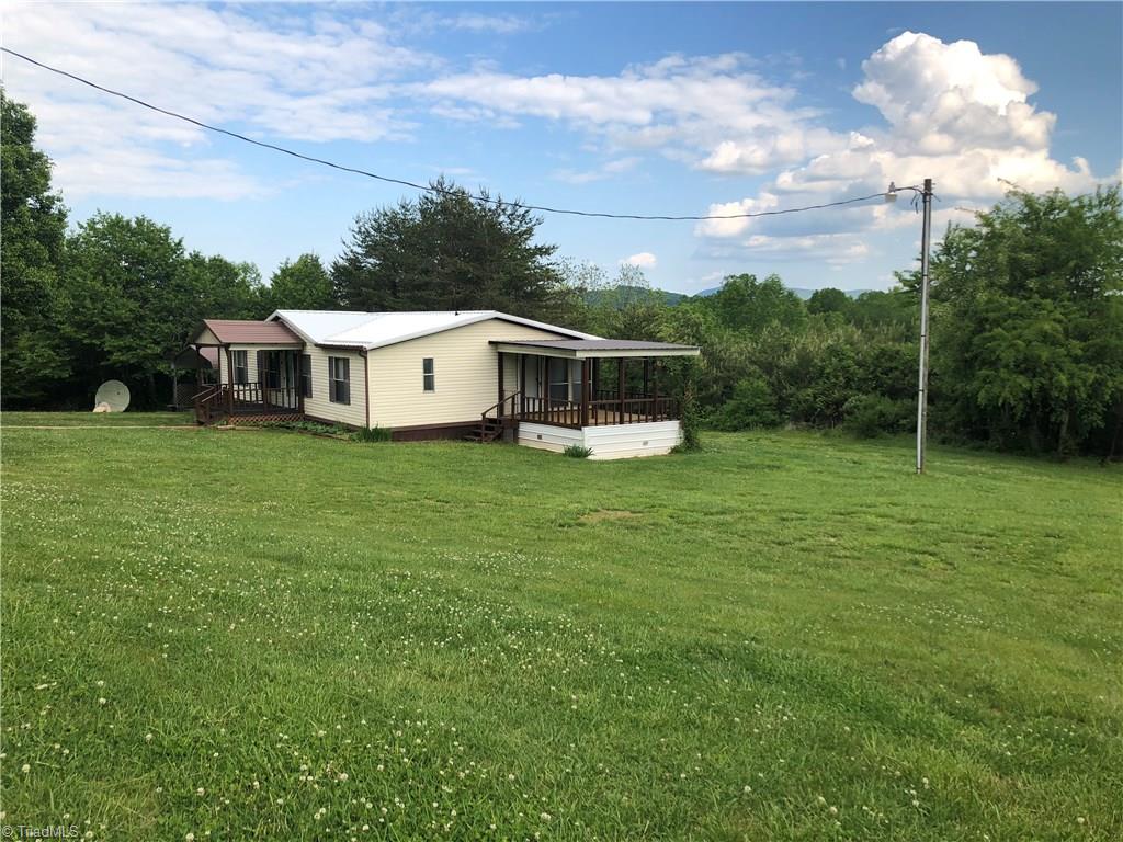 1071 Jackson Road Westfield, NC 27053 - Photo 3 of 19 Large side yard with plenty of room for a garden.