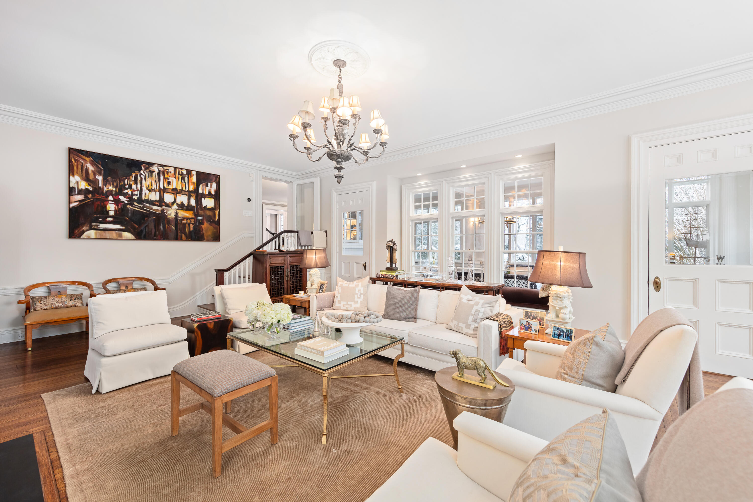 5 Middlesex Road Darien, CT 06820 - Photo 17 of 57 a living room with furniture chandelier and a table