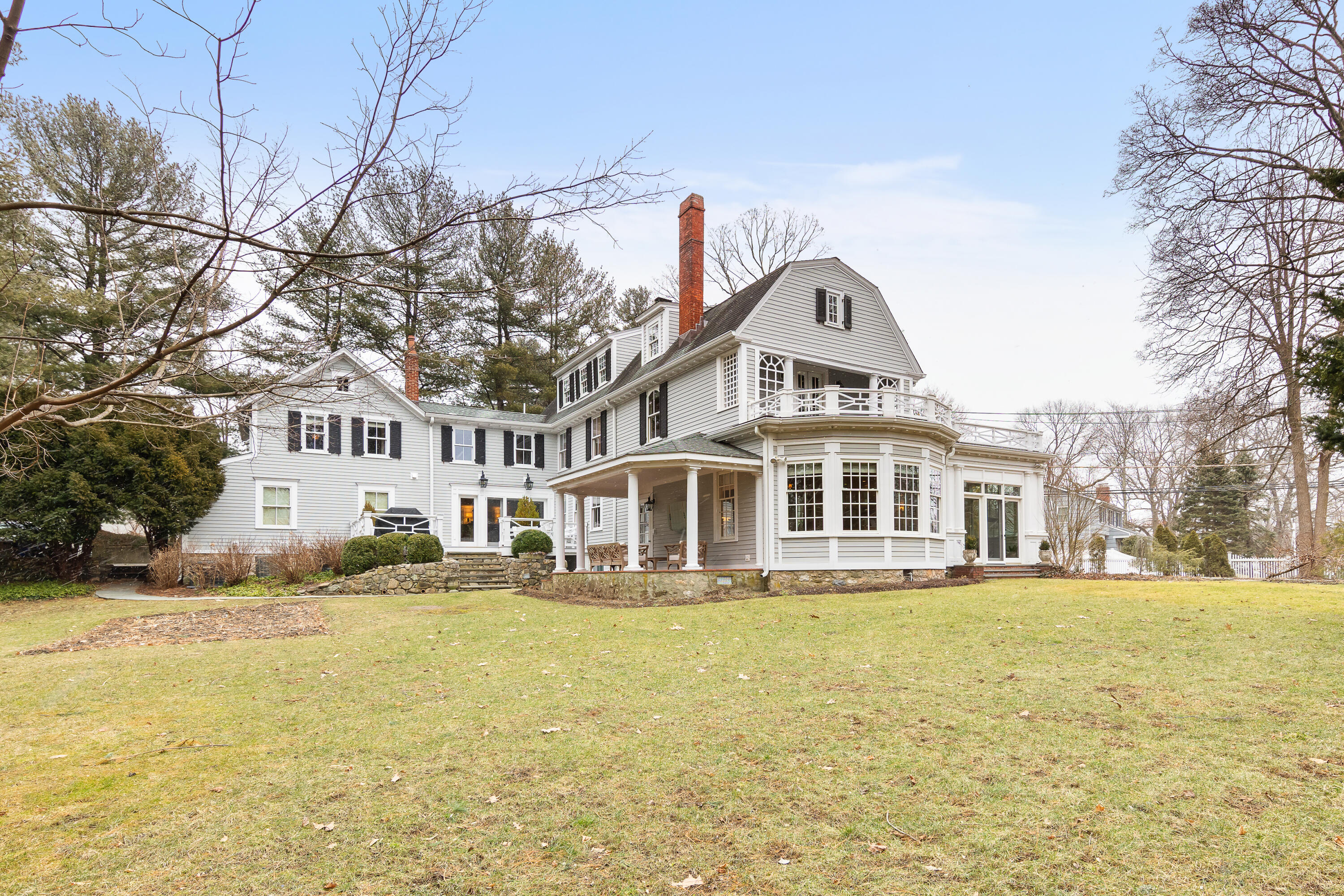 5 Middlesex Road Darien, CT 06820 - Photo 2 of 57 a front view of a house with a yard