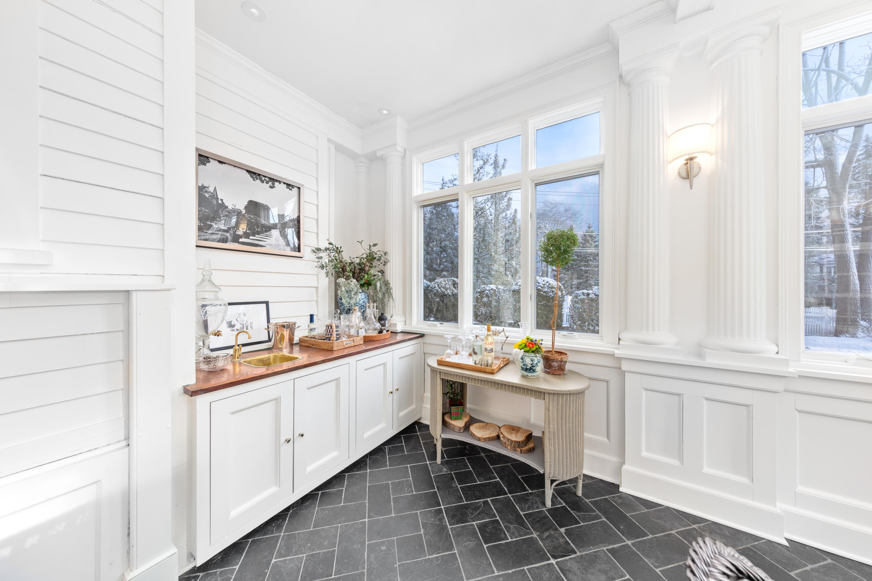5 Middlesex Road Darien, CT 06820 - Photo 21 of 57 a kitchen with a sink and wooden cabinets