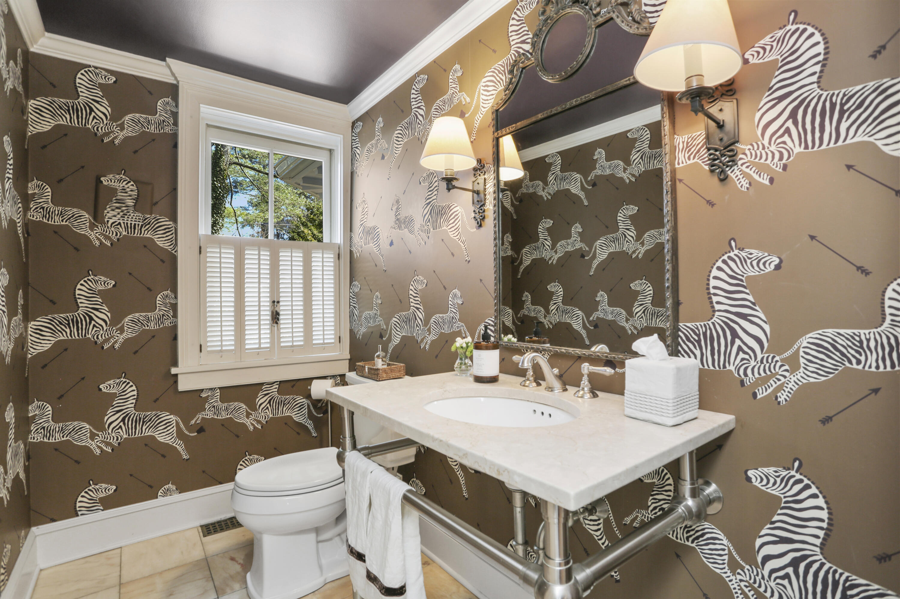 5 Middlesex Road Darien, CT 06820 - Photo 27 of 57 a bathroom with a sink a toilet and a mirror