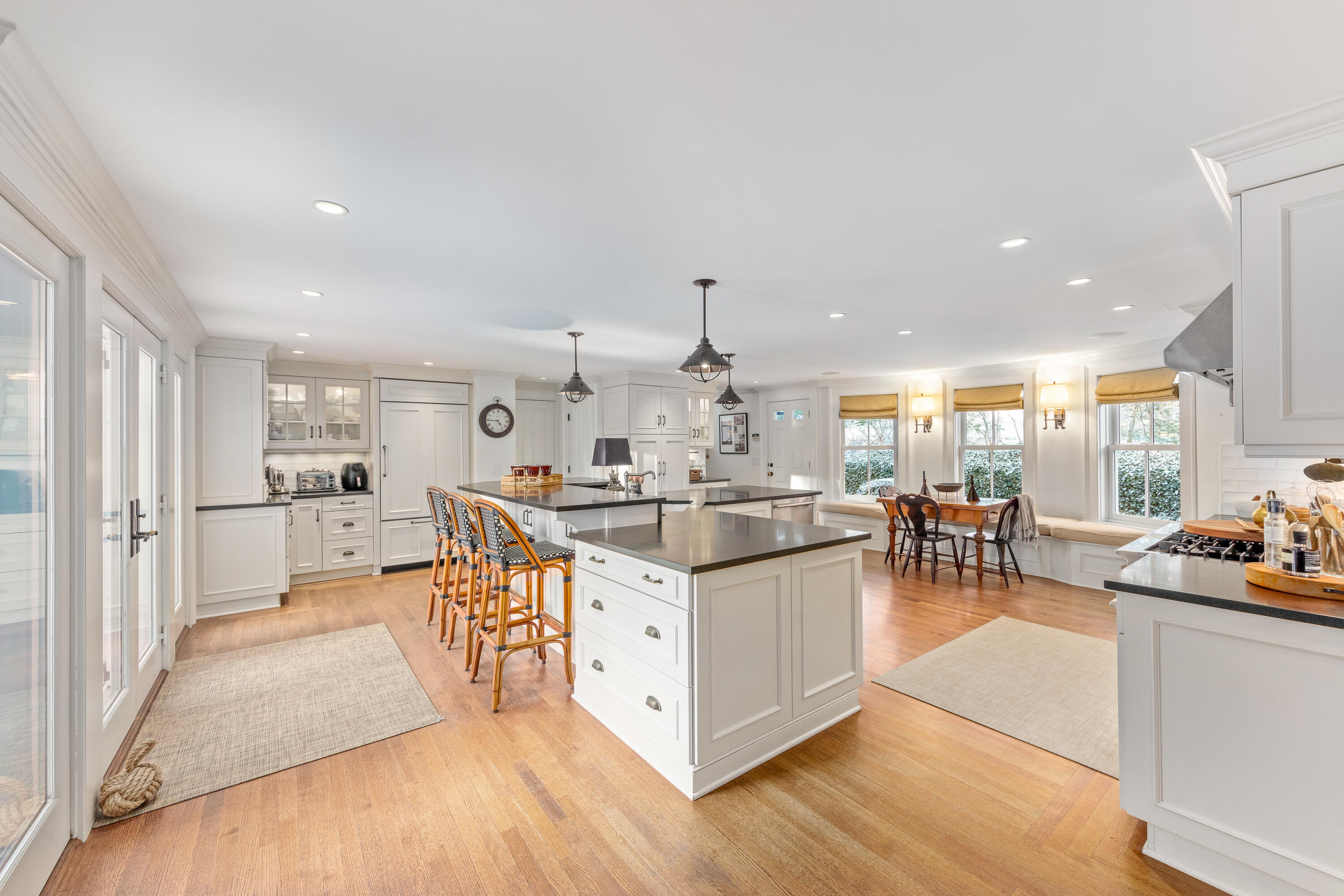5 Middlesex Road Darien, CT 06820 - Photo 28 of 57 a kitchen with stainless steel appliances kitchen island granite countertop a sink and cabinets