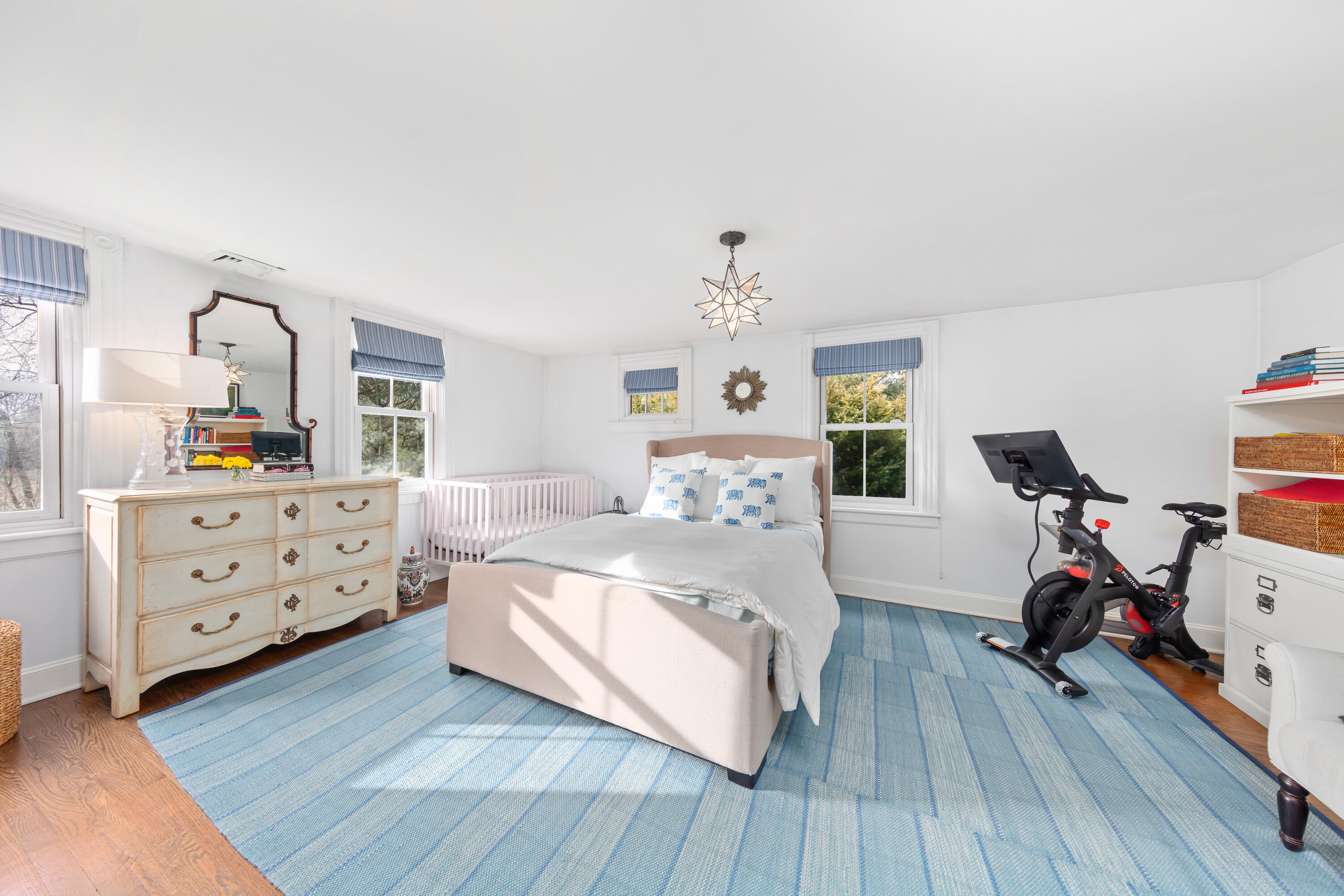 5 Middlesex Road Darien, CT 06820 - Photo 43 of 57 a bedroom with a bed and wooden floor