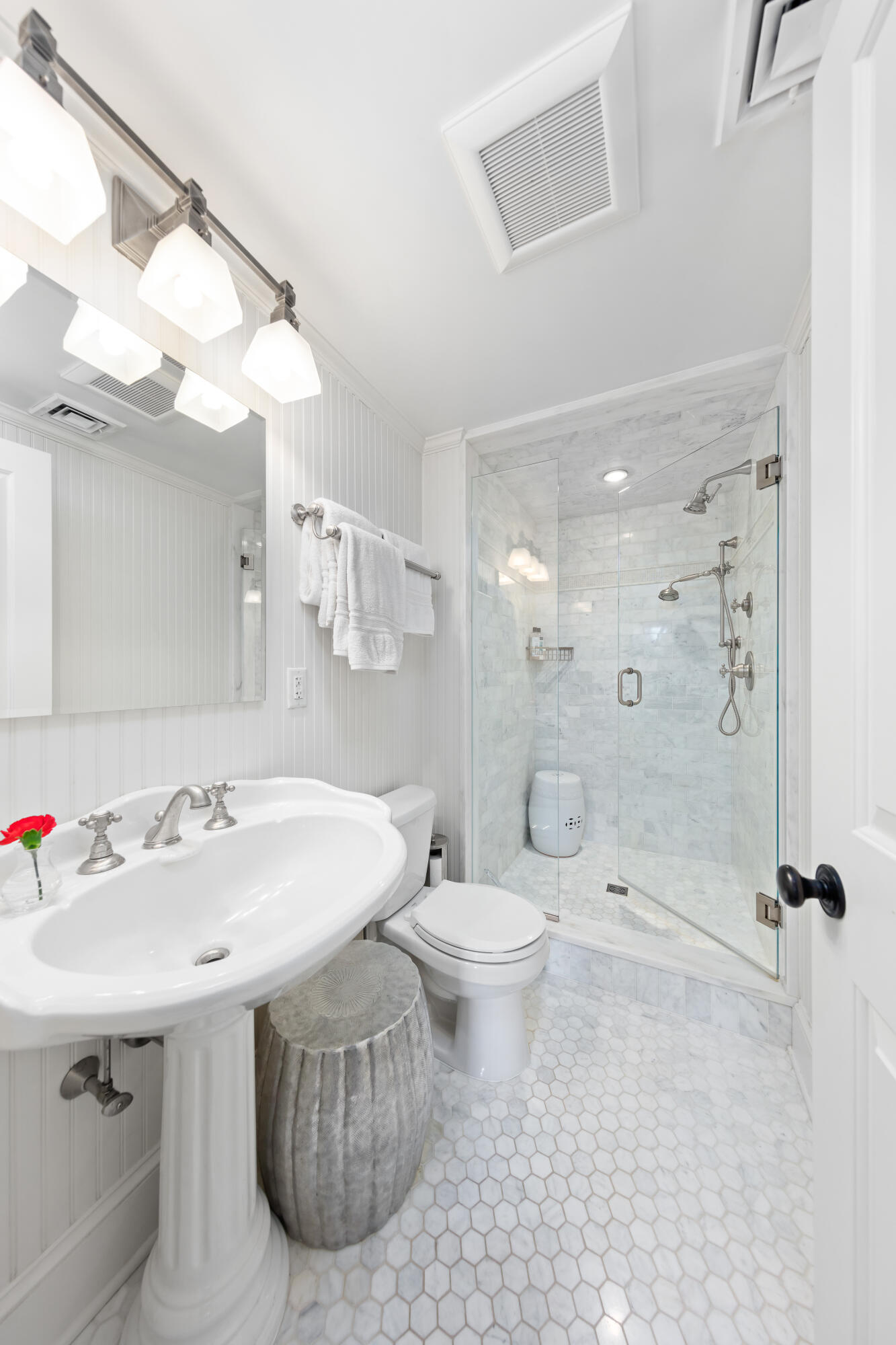 5 Middlesex Road Darien, CT 06820 - Photo 44 of 57 a bathroom with a sink a toilet and shower