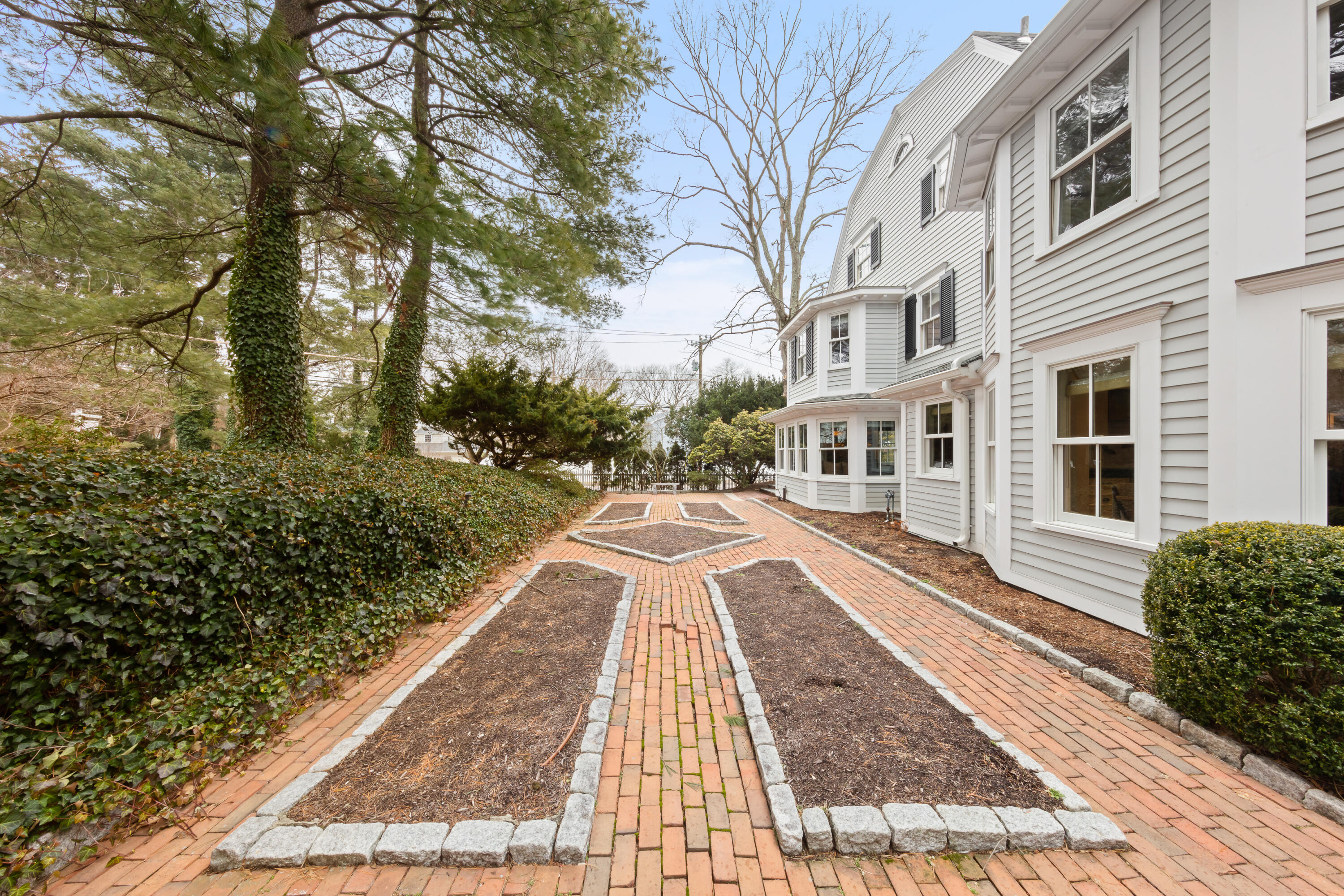 5 Middlesex Road Darien, CT 06820 - Photo 9 of 57 a view of a brick house with a yard
