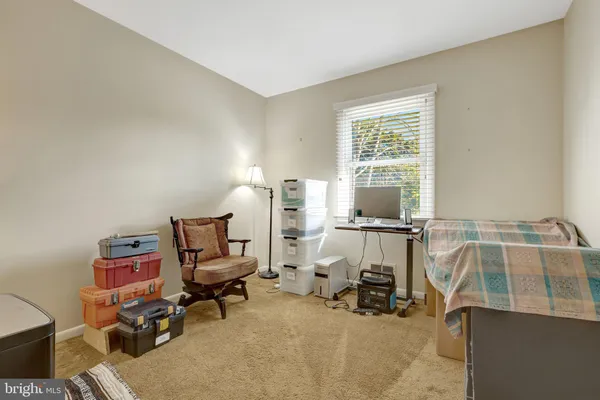 a room with furniture and a window