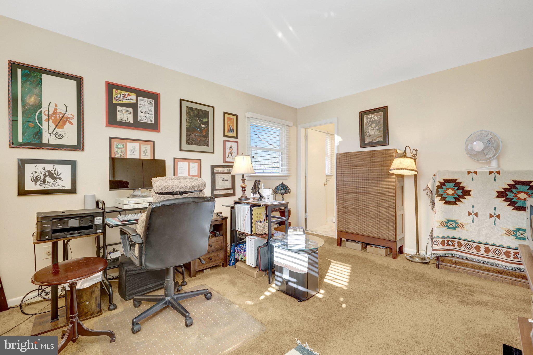 203 Locust Street Southwest Vienna, VA 22180 - Photo 23 of 54 a view of a livingroom with workspace and a window