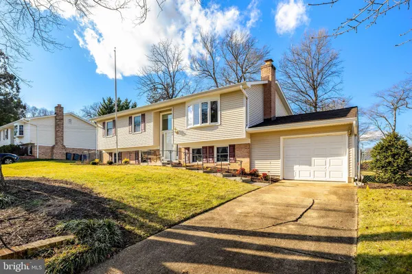 a front view of a house with swimming pool