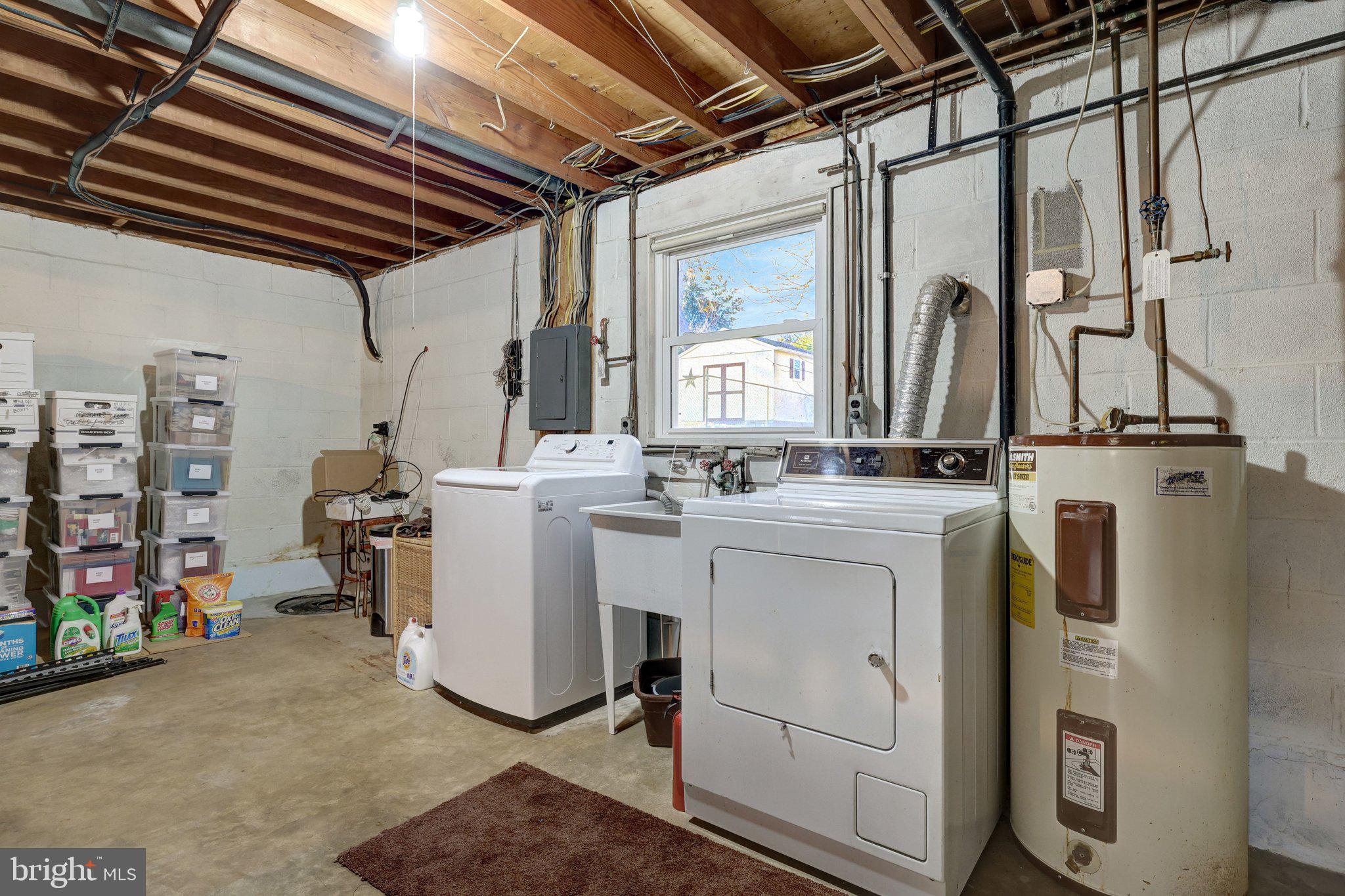 203 Locust Street Southwest Vienna, VA 22180 - Photo 33 of 54 a utility room with dryer and washer