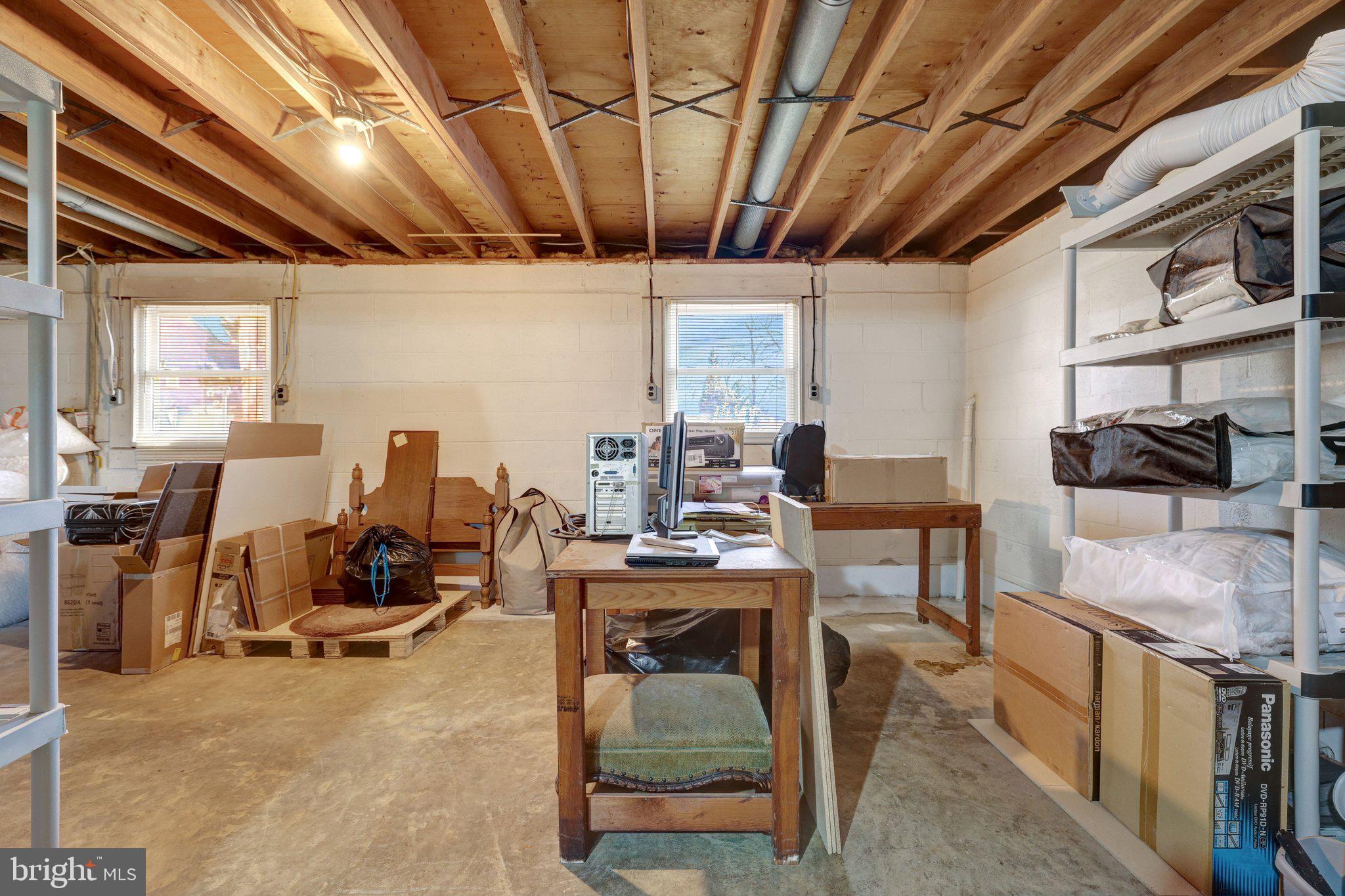 203 Locust Street Southwest Vienna, VA 22180 - Photo 34 of 54 a view of a workspace with furniture
