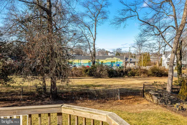 a view of a yard with an outdoor space