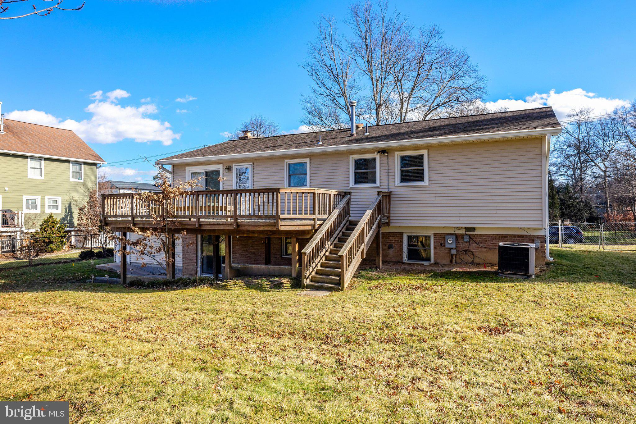 203 Locust Street Southwest Vienna, VA 22180 - Photo 37 of 54 a view of a house with a big yard and sitting area
