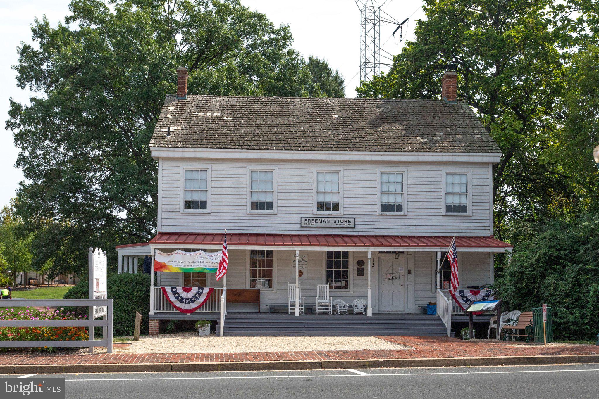 203 Locust Street Southwest Vienna, VA 22180 - Photo 44 of 54 a front view of a house with a garden