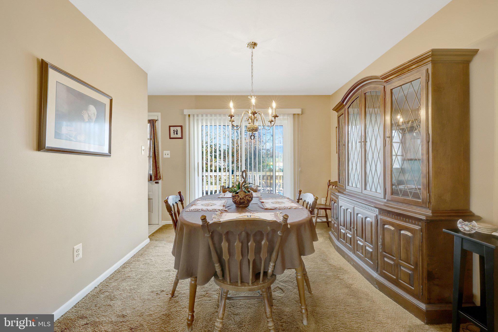203 Locust Street Southwest Vienna, VA 22180 - Photo 10 of 54 a view of a dining room with furniture window and outside view
