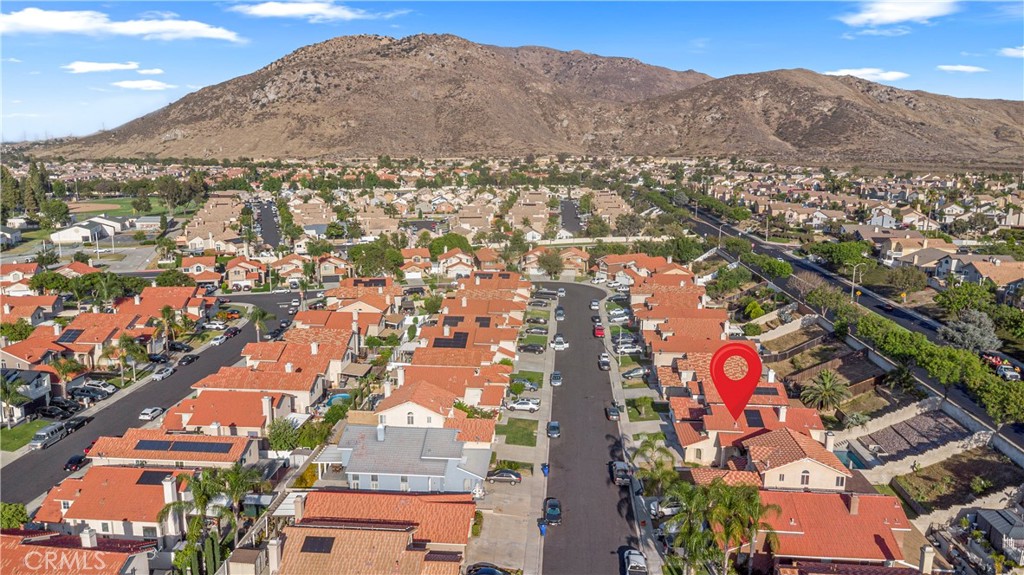 15417 Tobarra Road Fontana, CA 92337 - Photo 28 of 29 an aerial view of residential houses with outdoor space