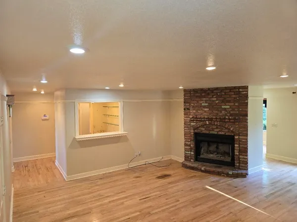 a view of a hallway with washer and dryer