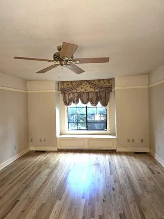 a bathroom with a shower and a toilet