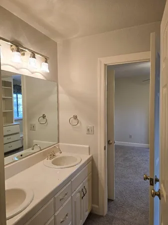 a bathroom with a shower and a toilet